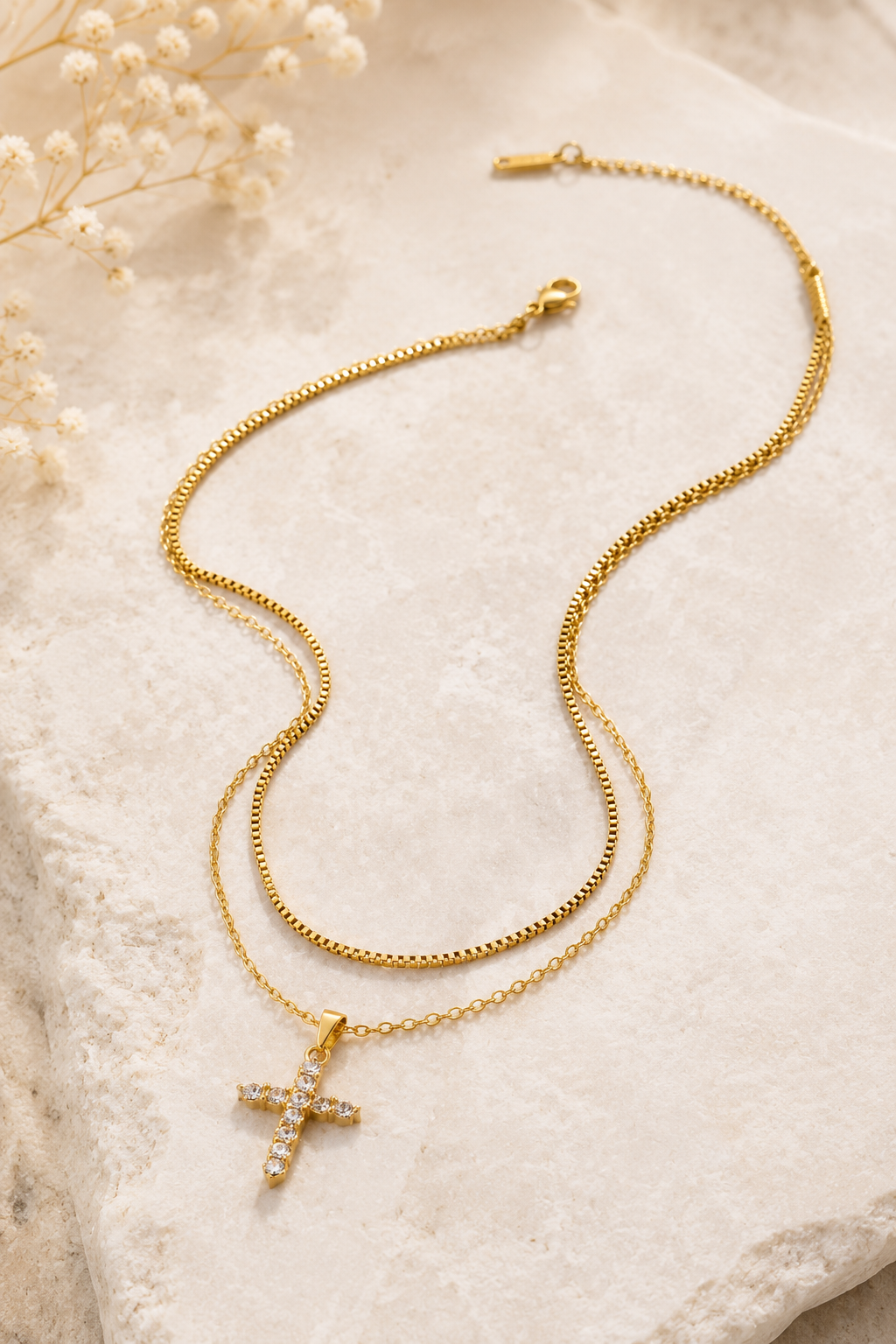 18K gold layered stainless steel necklace featuring a sparkling crystal cross pendant on delicate double chains.