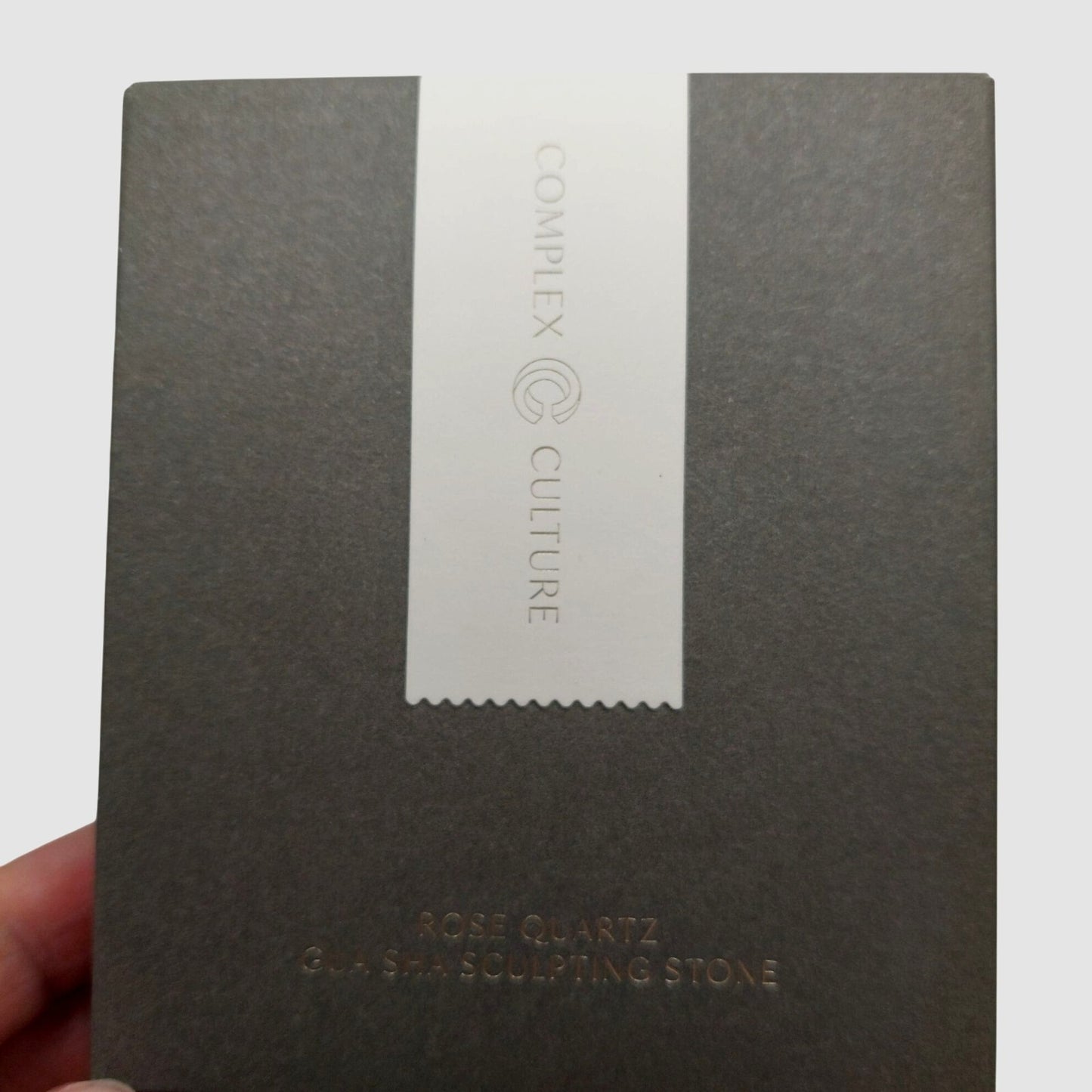 Rose Quartz Gua Sha Sculpting Stone With Textured Gray Pouch By Complex Culture