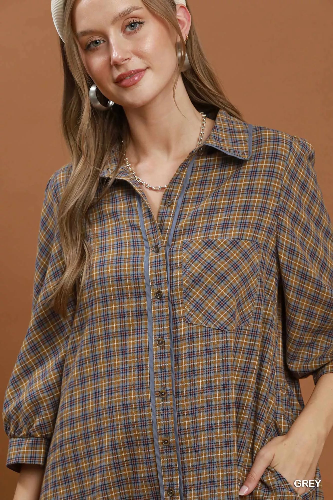 Woman wearing Umgee Grey Plaid Oversized Shirt Dress with button-front closure, chest pocket, collared neckline, and relaxed fit. Close View