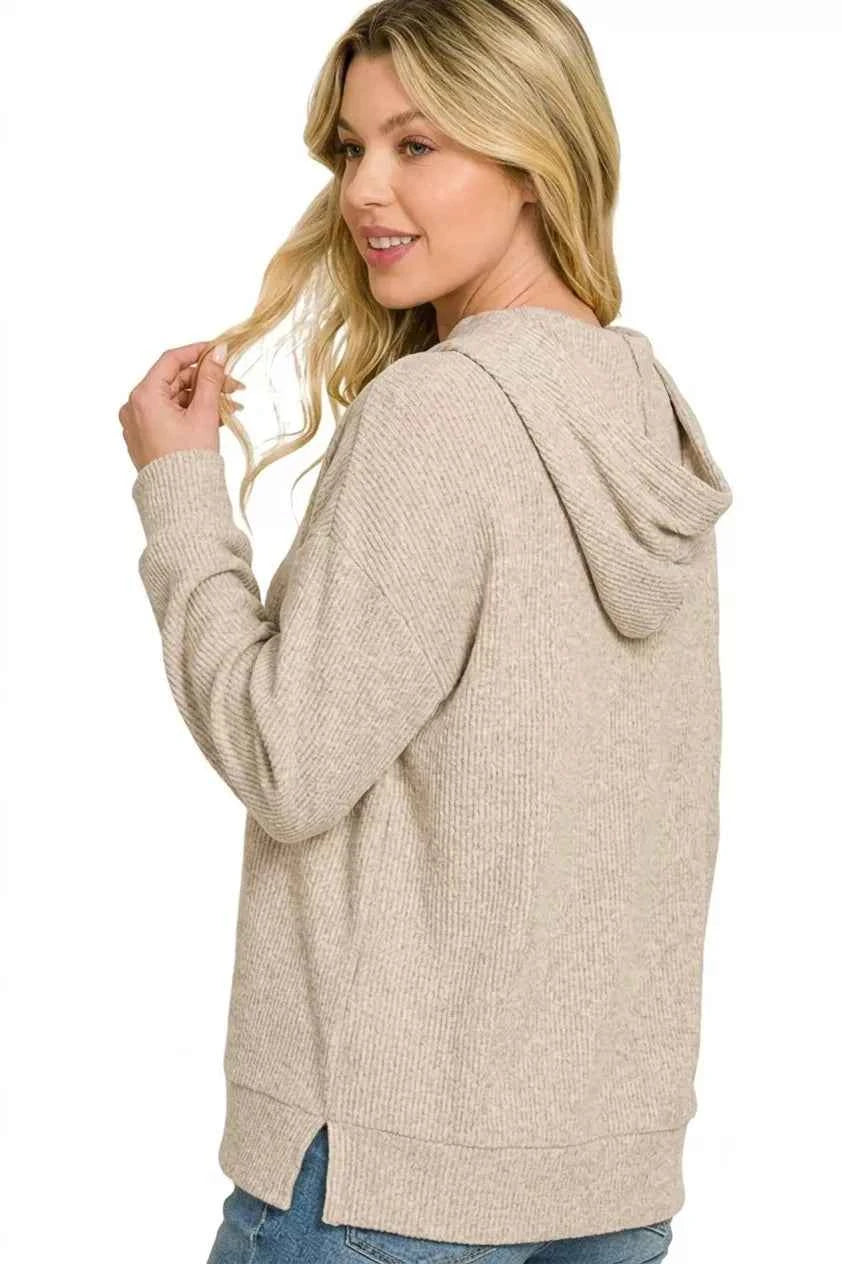 Woman wearing a Heather Mocha brushed ribbed hacci hoodie by Zenana with a relaxed fit and attached hood. Back View