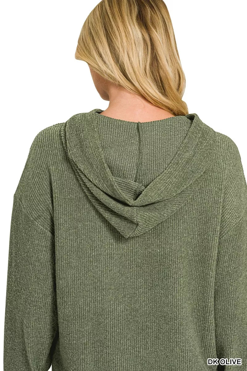 Woman wearing a dark olive brushed ribbed Hacci knit hoodie with long sleeves and a relaxed fit by Zenana. Back View 2