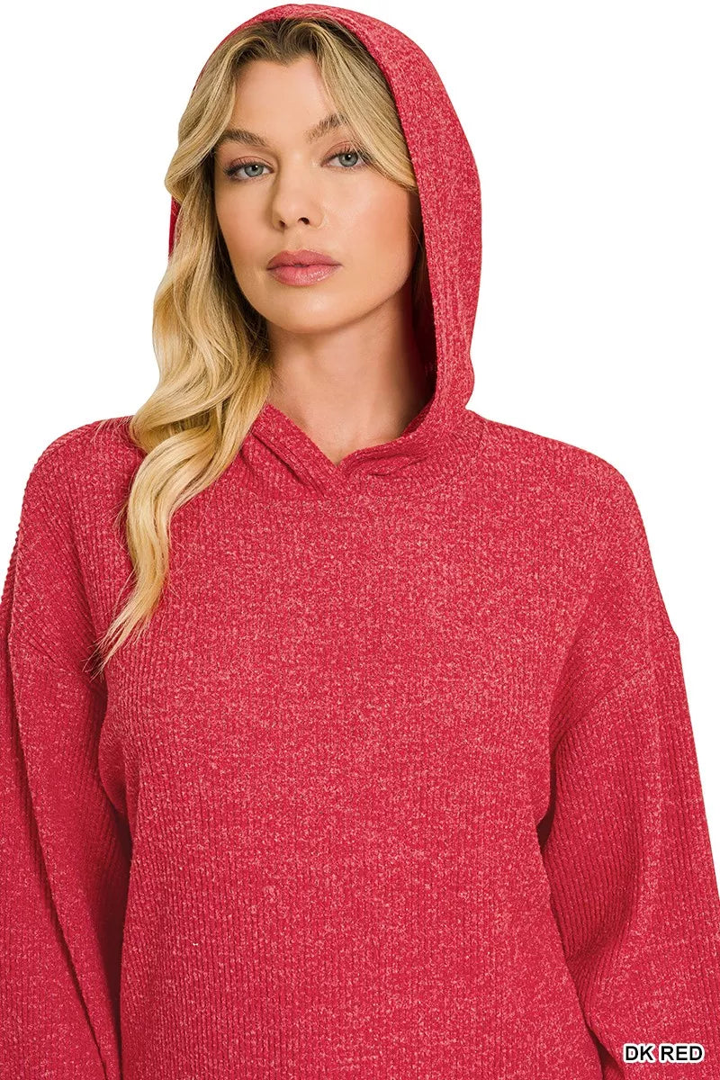 Woman wearing a dark red brushed ribbed hacci hoodie with drawstring hood styled with blue jeans by Zenana. close view