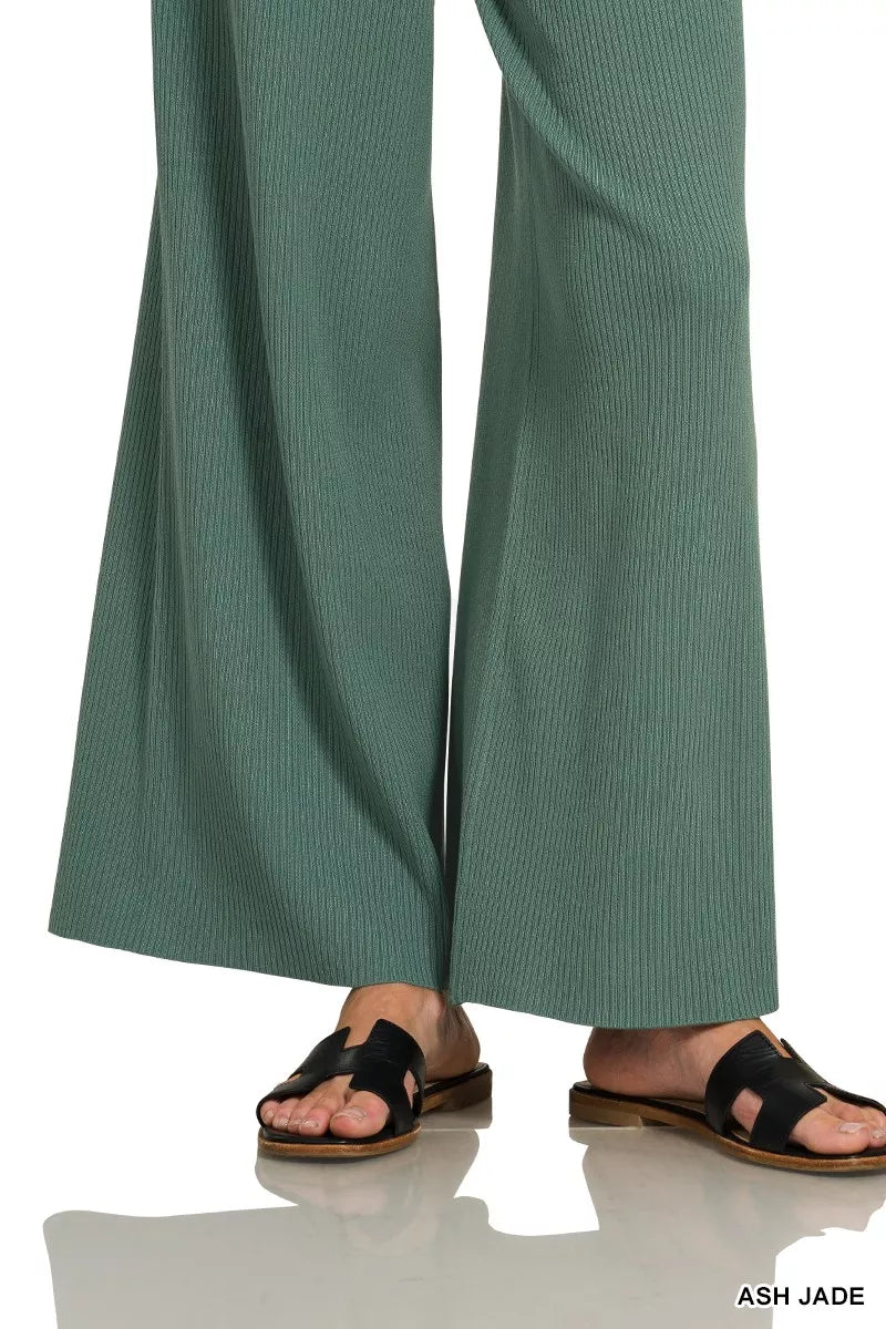 Woman wearing an Ash Jade ribbed two-piece sweater and wide leg pants set by Zenana featuring a relaxed fit and soft viscose knit fabric.