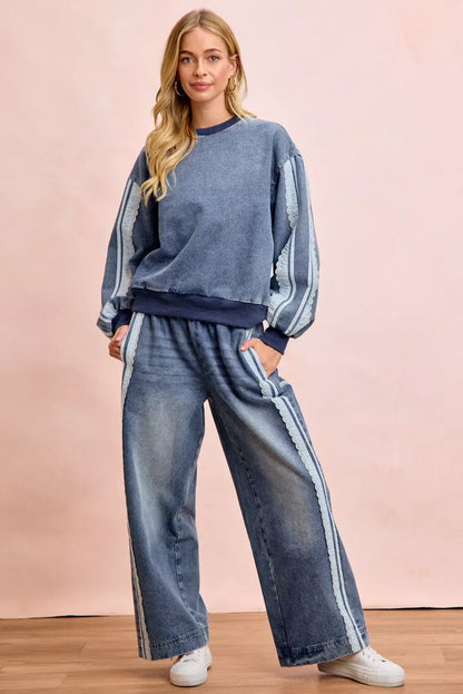 Women's washed denim jeans with lace side panel detailing, relaxed fit silhouette, and vintage-inspired finish by BiBi.