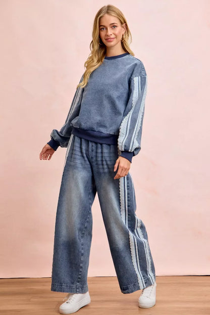 Women's washed denim jeans with lace side panel detailing, relaxed fit silhouette, and vintage-inspired finish by BiBi.
