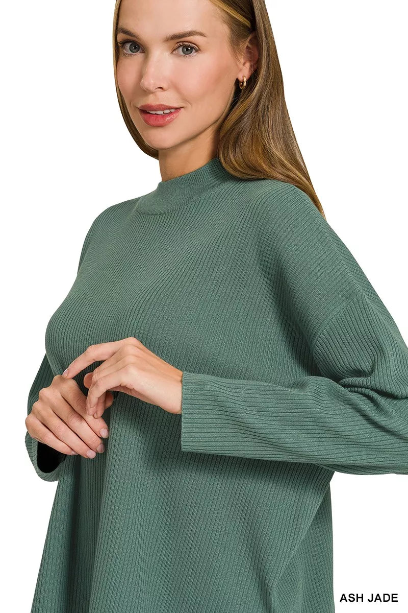 Woman wearing an Ash Jade ribbed two-piece sweater and wide leg pants set by Zenana featuring a relaxed fit and soft viscose knit fabric.
