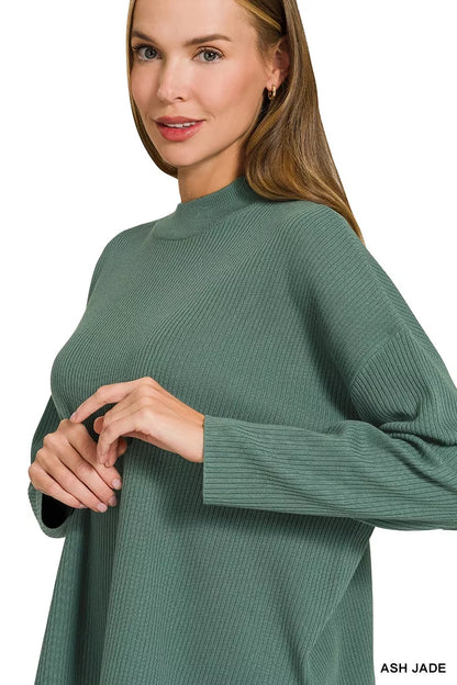 Woman wearing an Ash Jade ribbed two-piece sweater and wide leg pants set by Zenana featuring a relaxed fit and soft viscose knit fabric.