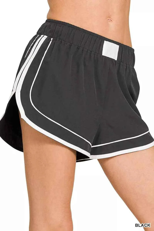 Black Soft Woven Lined Dolphin Shorts by Zenana