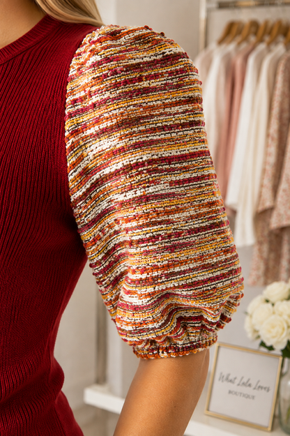 Burgundy knit top with multicolor tweed puff sleeves by Voy sleeve close view