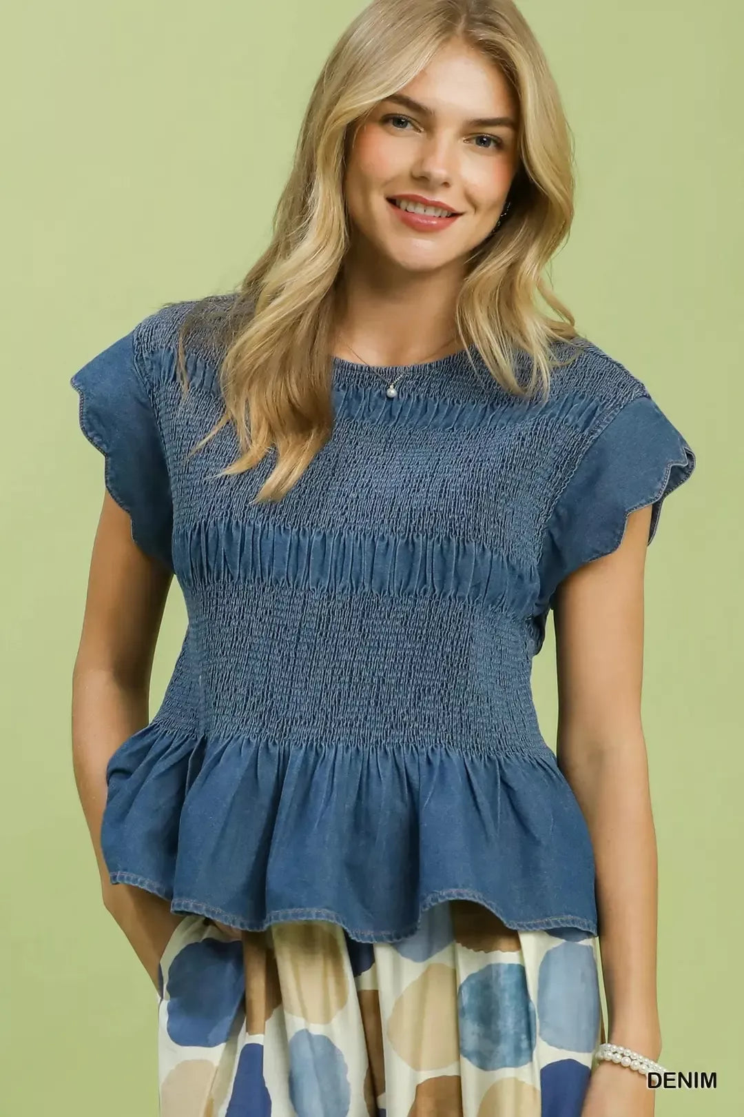 Denim Smocked Peplum Top with Scalloped Ruffle Cap Sleeves by Umgee Front View
