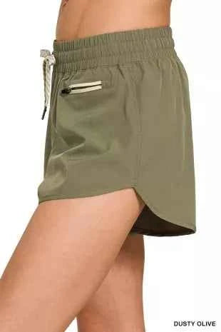 Dusty Olive Soft Woven Lined Shorts With Zip Coin Pocket by Zenana