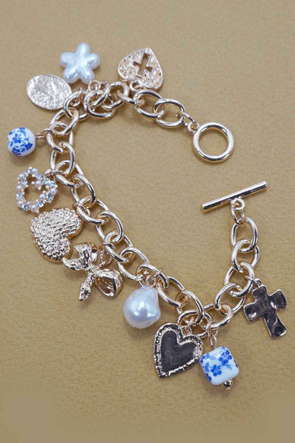 CERAMIC PORCELAIN HEART BOW PEARL CHARM BRACELET | 80B1342: Gold
