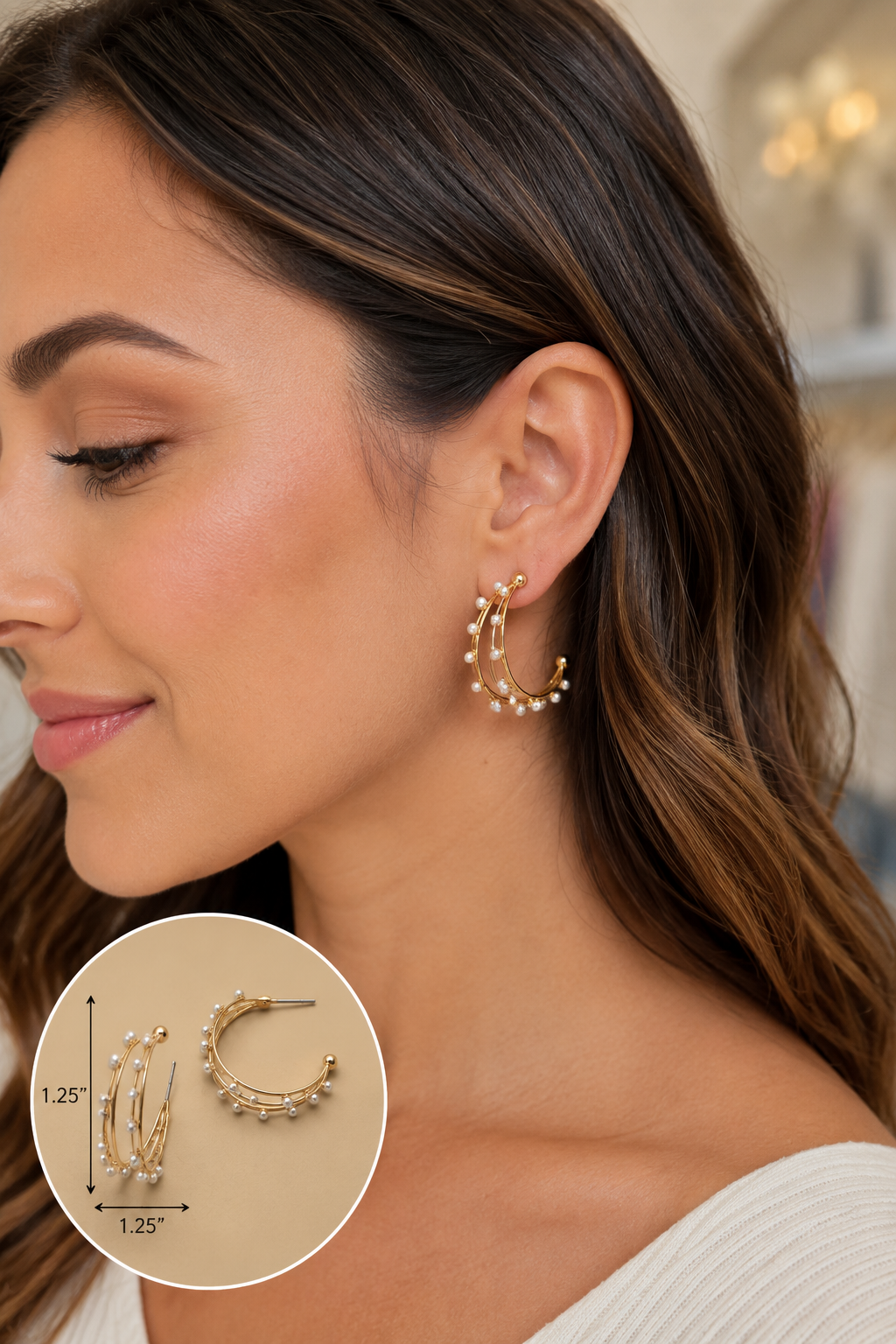 A close-up of a woman wearing a gold crescent hoop earring with small pearl-like beads. A circular inset at the bottom left shows the earring from the front with dimensions labeled 1.