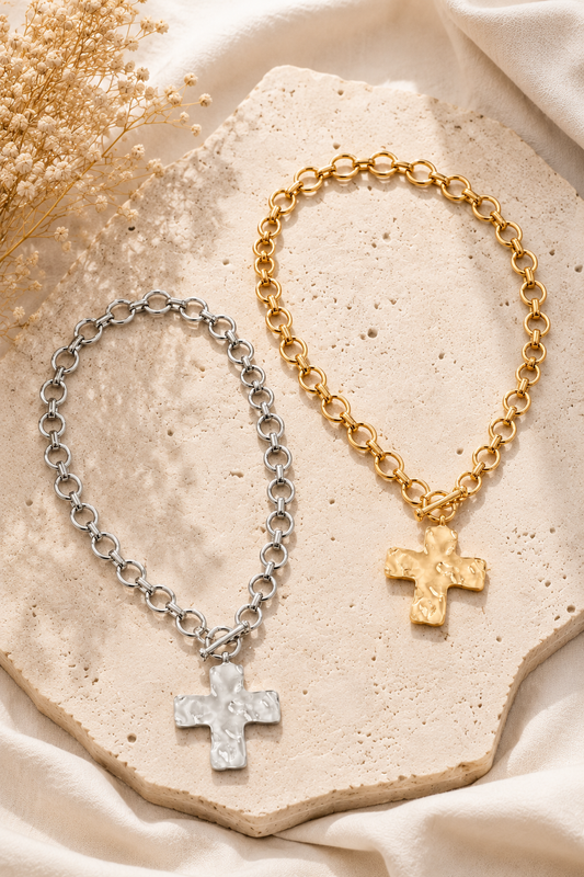 Hammered cross toggle chain necklace with oversized link chain available in gold and silver. Flat Lay