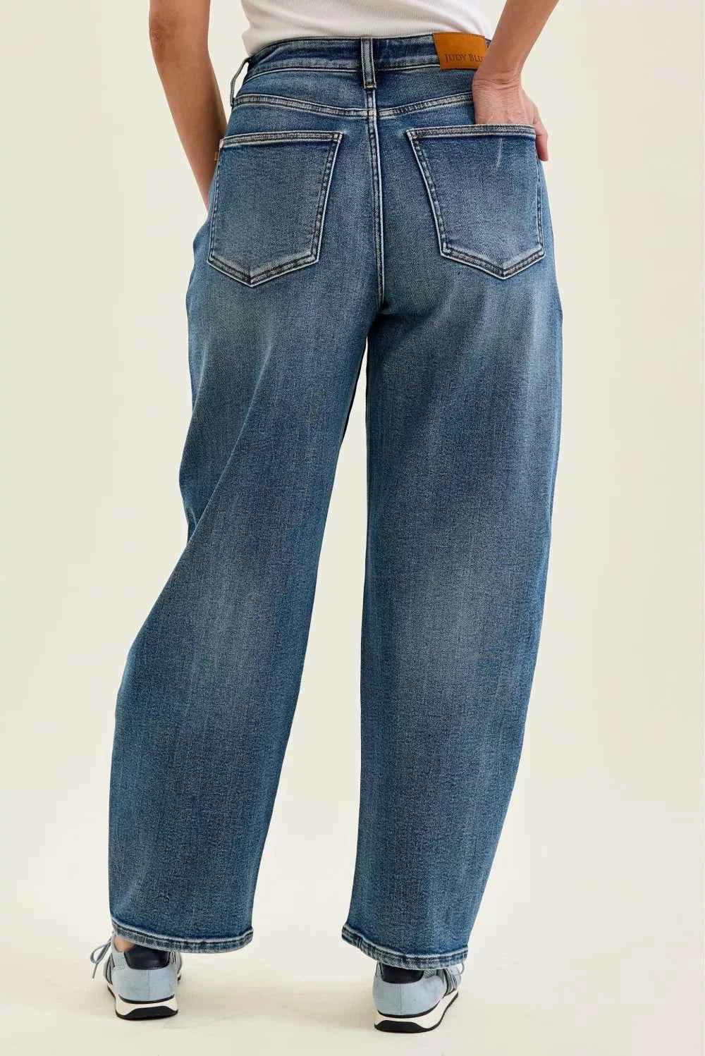 Judy Blue High Waist Marlow Arc Jeans in weathered indigo wash with relaxed arc-leg silhouette and high-rise waist. Back View