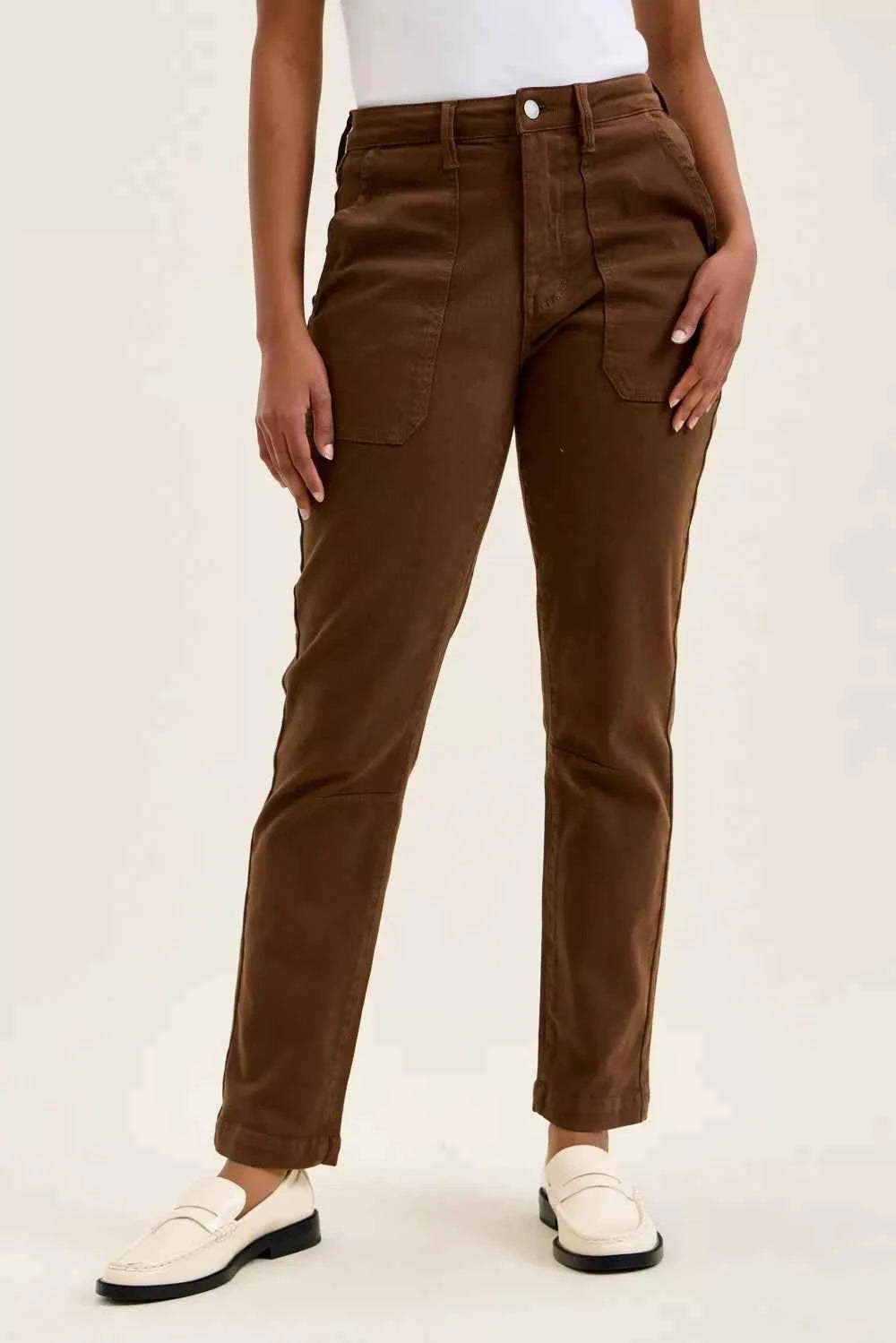Model wearing Judy Blue Aurora Weekender high waist mahogany jeans with knee dart detailing and ankle-length silhouette. Front View