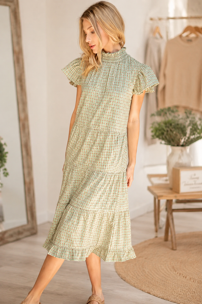 Sage plaid smocked neck tiered midi dress with ruffle sleeves by Voy