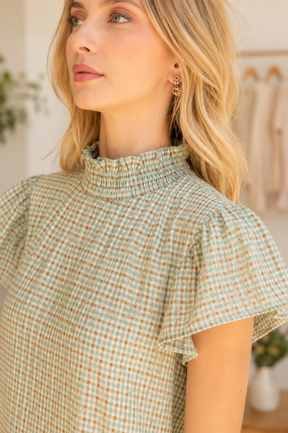 Sage plaid smocked neck tiered midi dress with ruffle sleeves by Voy
