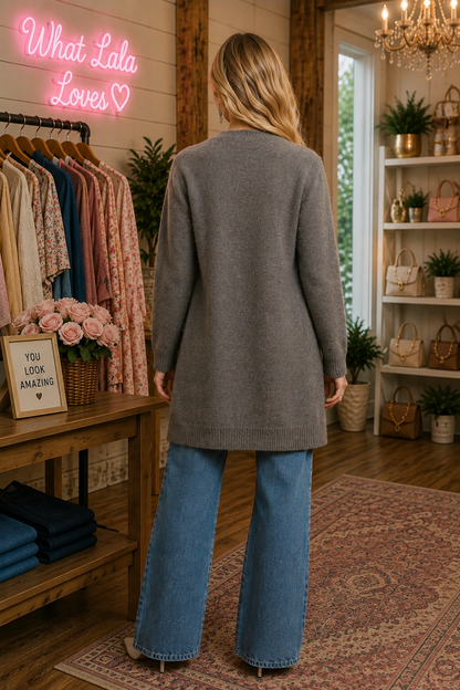 Umgee longline button front knit cardigan with pockets styled in a boutique grey back view