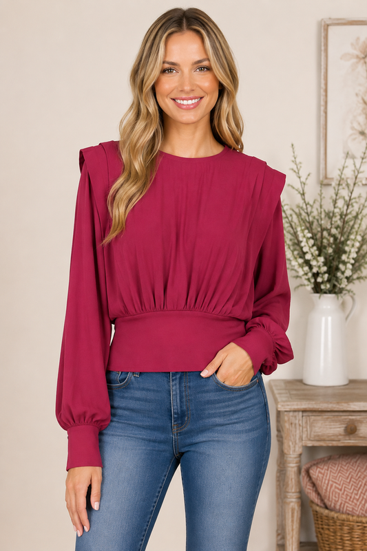 Umgee women's long sleeve smocked waist blouse with gathered front, full sleeves and keyhole back. Burgundy