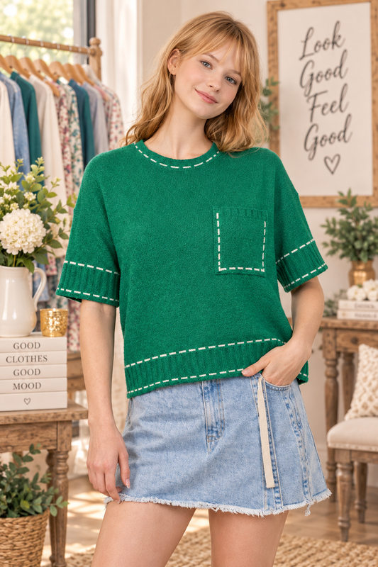 VERY J stitch detail knit sweater top with round neckline, short sleeves, patch pocket, and ribbed hem front view
