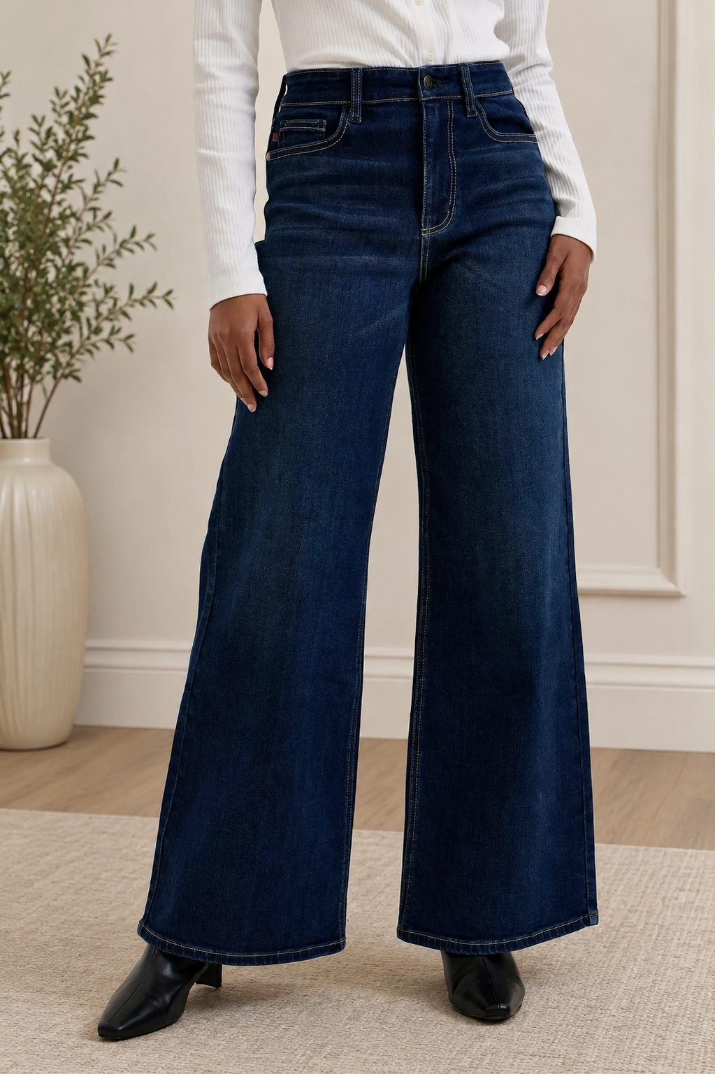 Woman wearing Judy Blue high waist wide leg dark wash jeans with a relaxed silhouette and premium stretch denim.
Front View