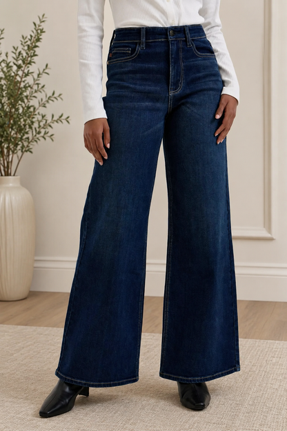 Woman wearing Judy Blue high waist wide leg dark wash jeans with a relaxed silhouette and premium stretch denim.
Front View