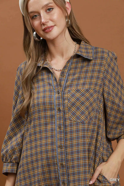 Woman wearing Umgee Grey Plaid Oversized Shirt Dress with button-front closure, chest pocket, collared neckline, and relaxed fit. Close View