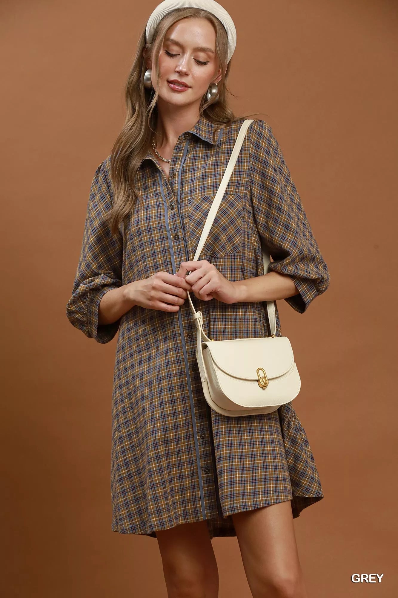 Woman wearing Umgee Grey Plaid Oversized Shirt Dress with button-front closure, chest pocket, collared neckline, and relaxed fit. Front View