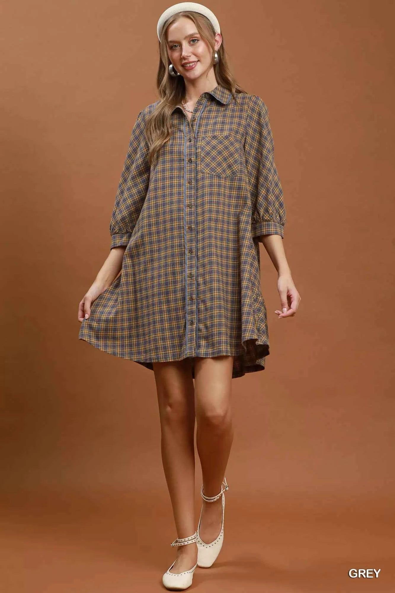 Woman wearing Umgee Grey Plaid Oversized Shirt Dress with button-front closure, chest pocket, collared neckline, and relaxed fit. Full view