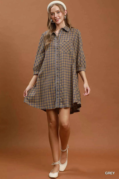Woman wearing Umgee Grey Plaid Oversized Shirt Dress with button-front closure, chest pocket, collared neckline, and relaxed fit. Full view