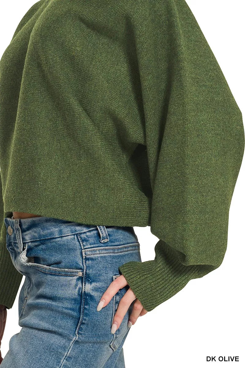 Woman wearing Zenana Dark Olive Boat Neck Balloon Sleeve Sweater with oversized fit and ribbed cuffs paired with denim jeans. Side View 2