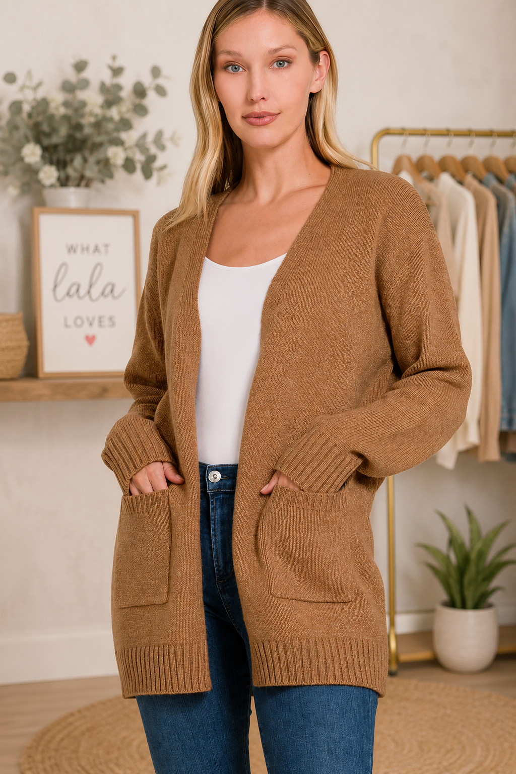 Woman wearing Zenana deep camel open front lightweight knit cardigan with front pockets and ribbed trim. front view