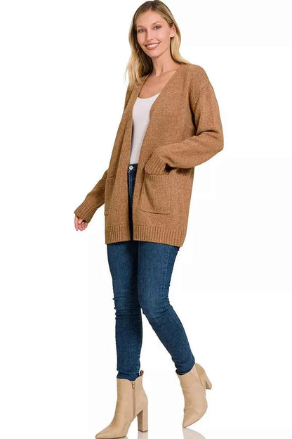 Woman wearing Zenana deep camel open front lightweight knit cardigan with front pockets and ribbed trim. full View