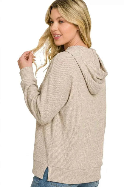 Woman wearing a Heather Mocha brushed ribbed hacci hoodie by Zenana with a relaxed fit and attached hood. Back View