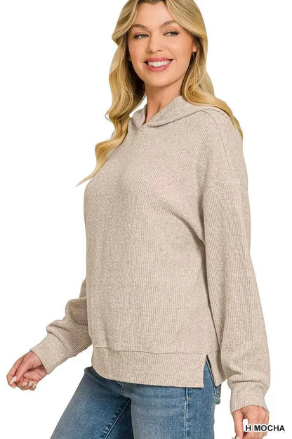 Woman wearing a Heather Mocha brushed ribbed hacci hoodie by Zenana with a relaxed fit and attached hood. Side View