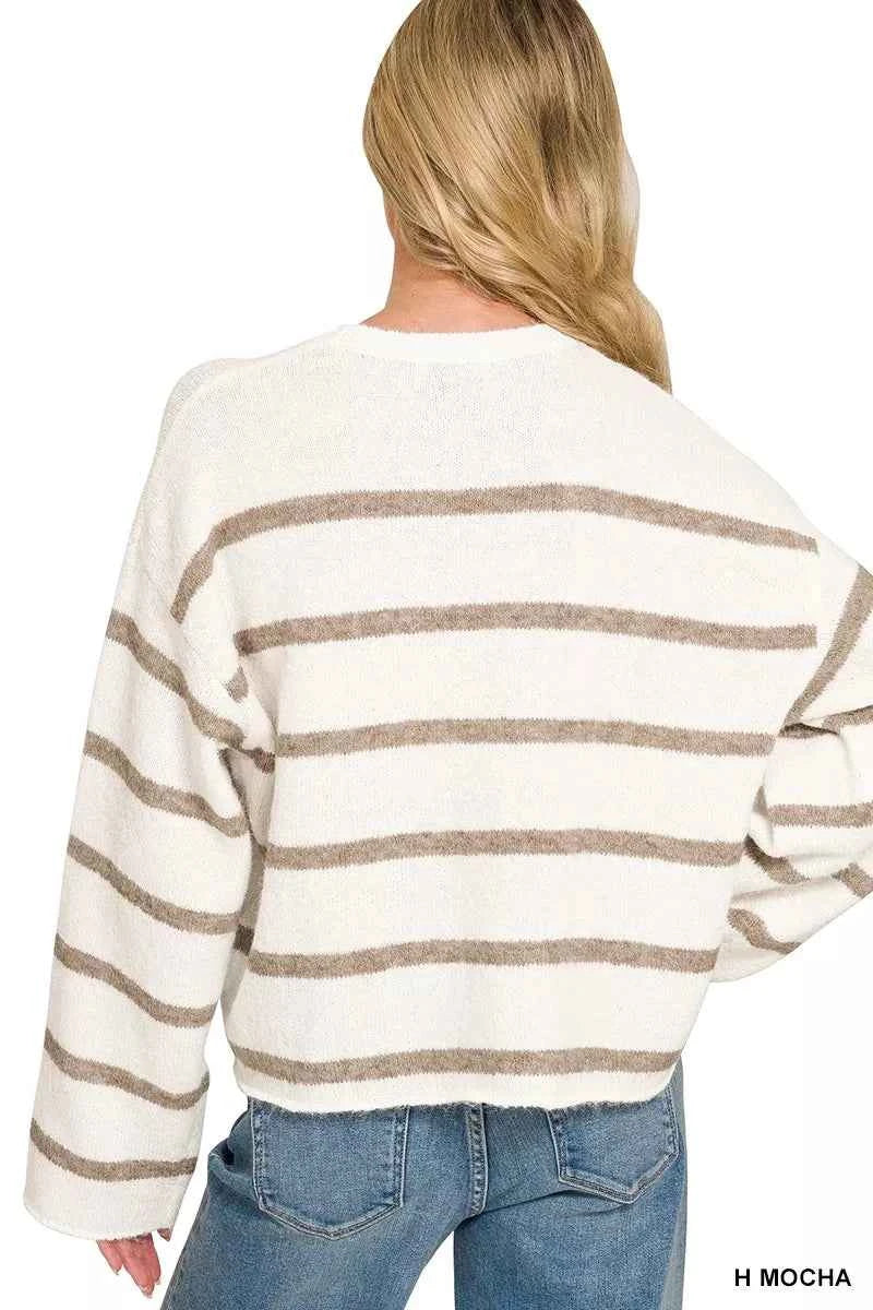 Woman wearing a Zenana Heather Mocha striped wool blend sweater with long sleeves and a relaxed fit. Back View