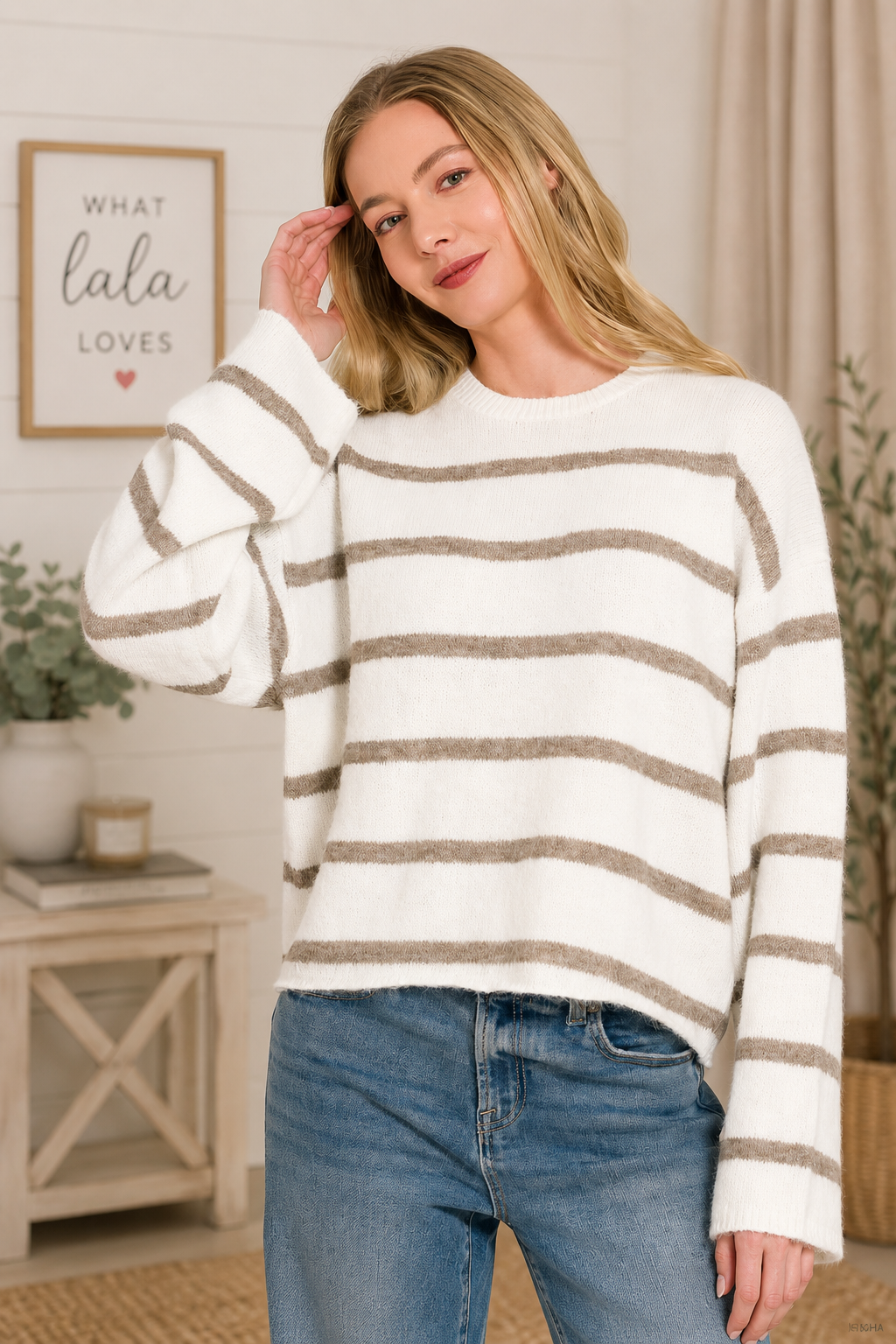 Woman wearing a Zenana Heather Mocha striped wool blend sweater with long sleeves and a relaxed fit. Front view