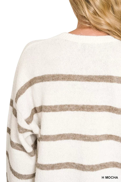 Woman wearing a Zenana Heather Mocha striped wool blend sweater with long sleeves and a relaxed fit. close view 2