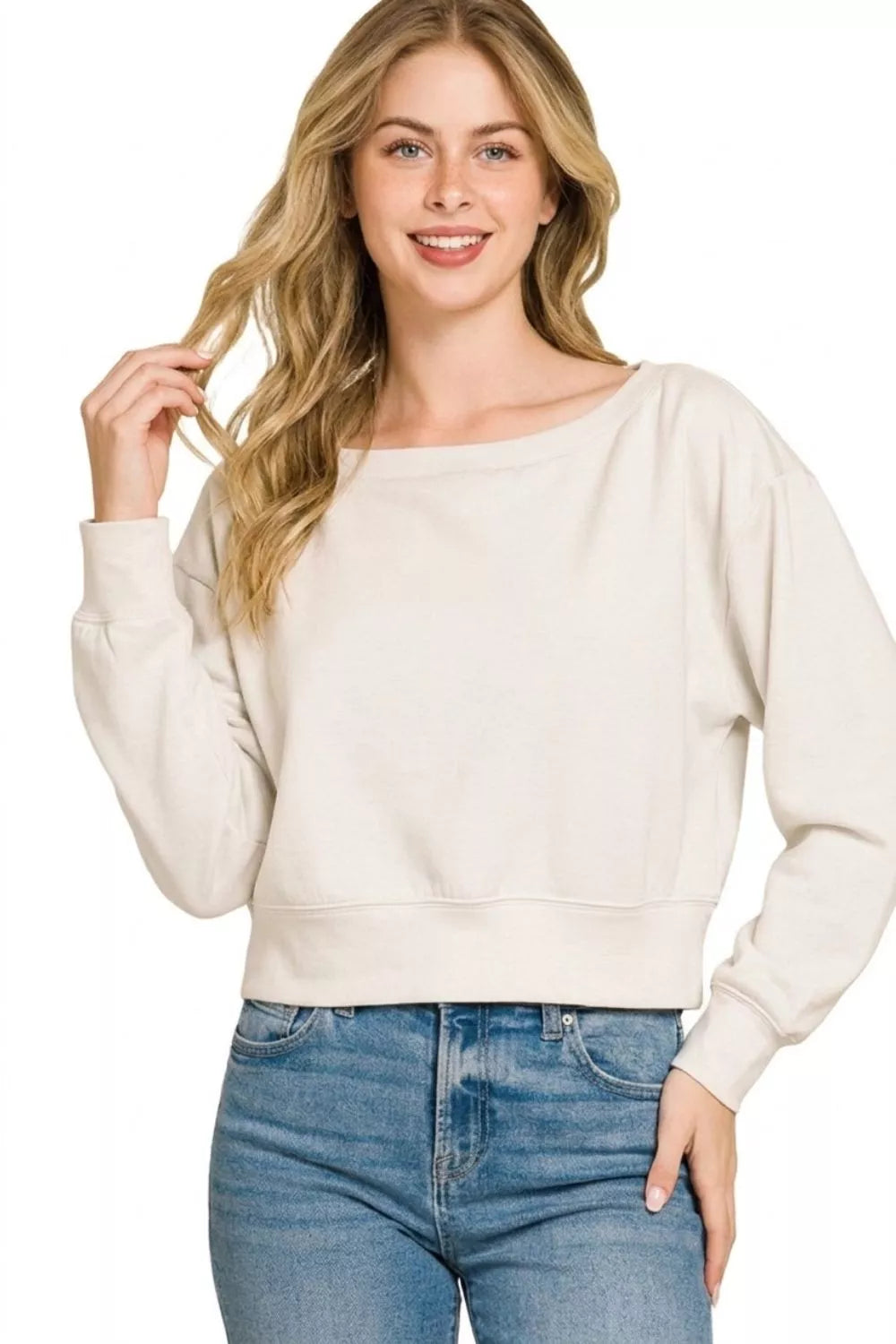 Woman wearing a bone scuba cropped boat neck pullover sweatshirt by Zenana. Front View 2