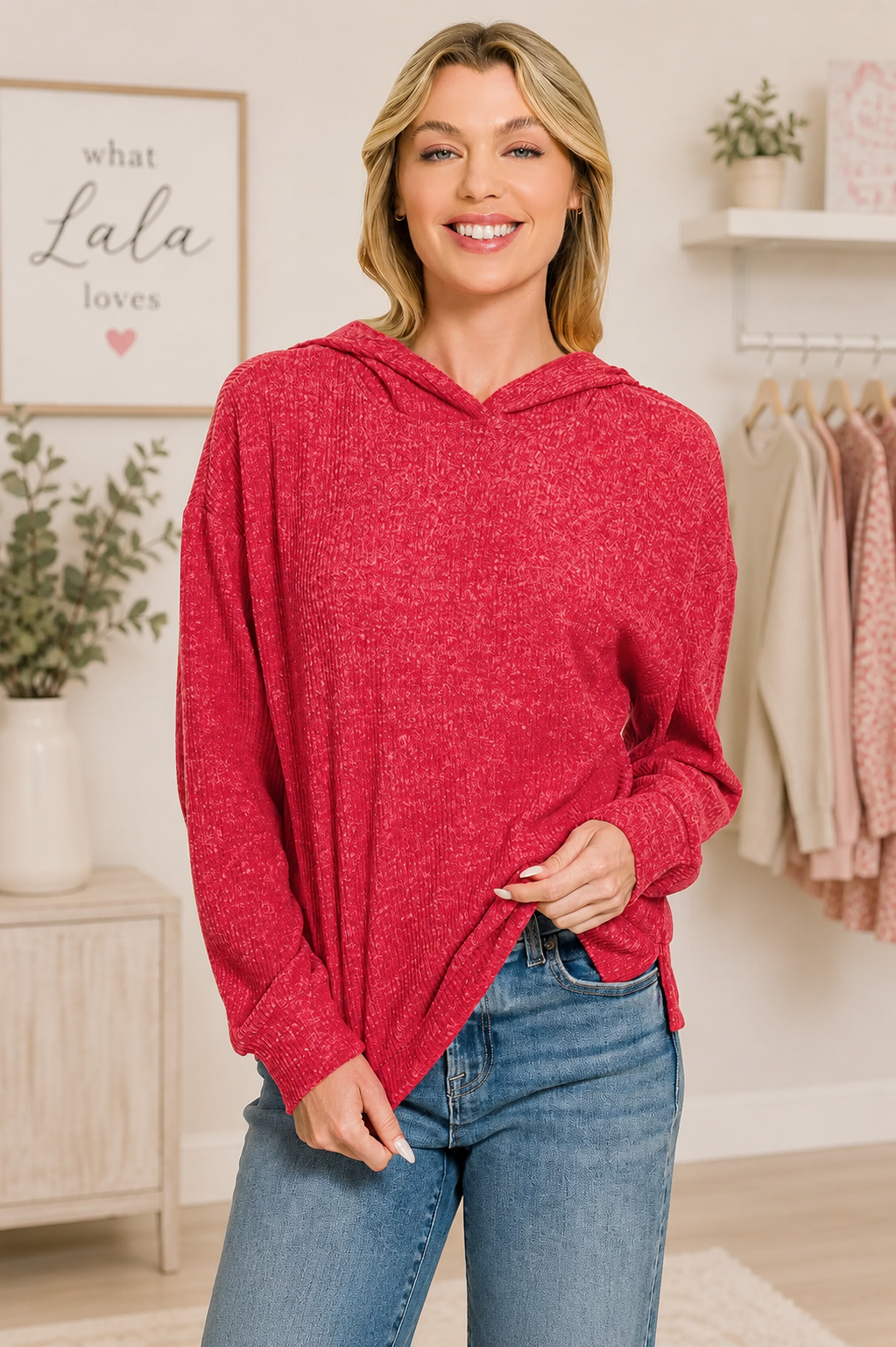 Woman wearing a dark red brushed ribbed hacci hoodie with drawstring hood styled with blue jeans by Zenana. Front view