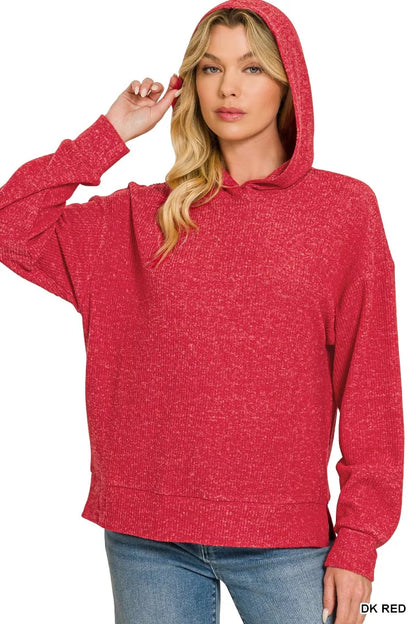 Woman wearing a dark red brushed ribbed hacci hoodie with drawstring hood styled with blue jeans by Zenana. Front View 2