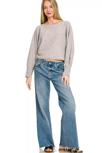 Woman wearing a heather grey boat neck balloon sleeve knit sweater by Zenana. Full View