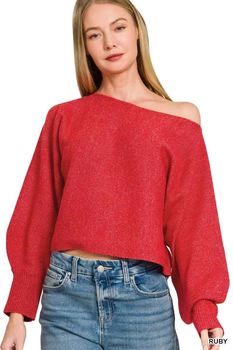 Woman wearing a ruby red boat neck balloon sleeve knit sweater by Zenana with relaxed fit and ribbed cuffs. Front View 2