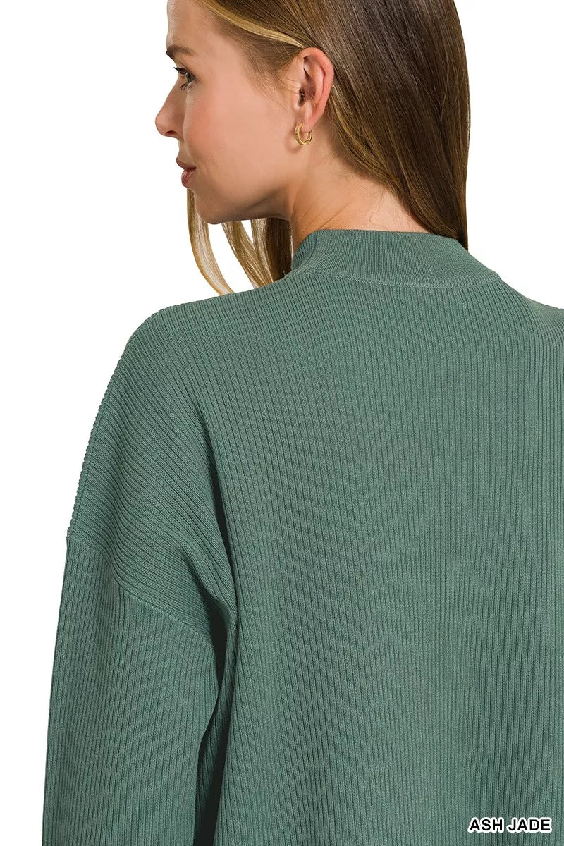 Woman wearing an Ash Jade ribbed two-piece sweater and wide leg pants set by Zenana featuring a relaxed fit and soft viscose knit fabric. Close View