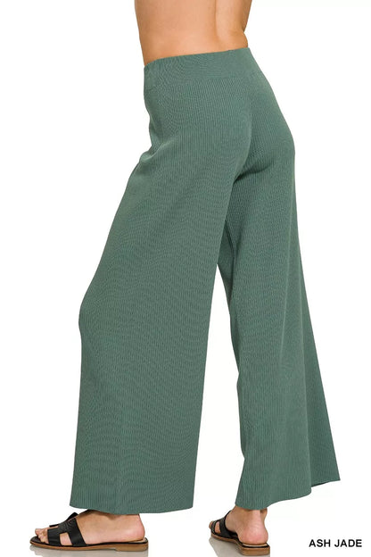 Woman wearing an Ash Jade ribbed two-piece sweater and wide leg pants set by Zenana featuring a relaxed fit and soft viscose knit fabric. Side View 2