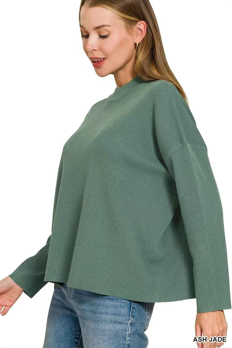 Woman wearing an Ash Jade ribbed two-piece sweater and wide leg pants set by Zenana featuring a relaxed fit and soft viscose knit fabric. Top Side View