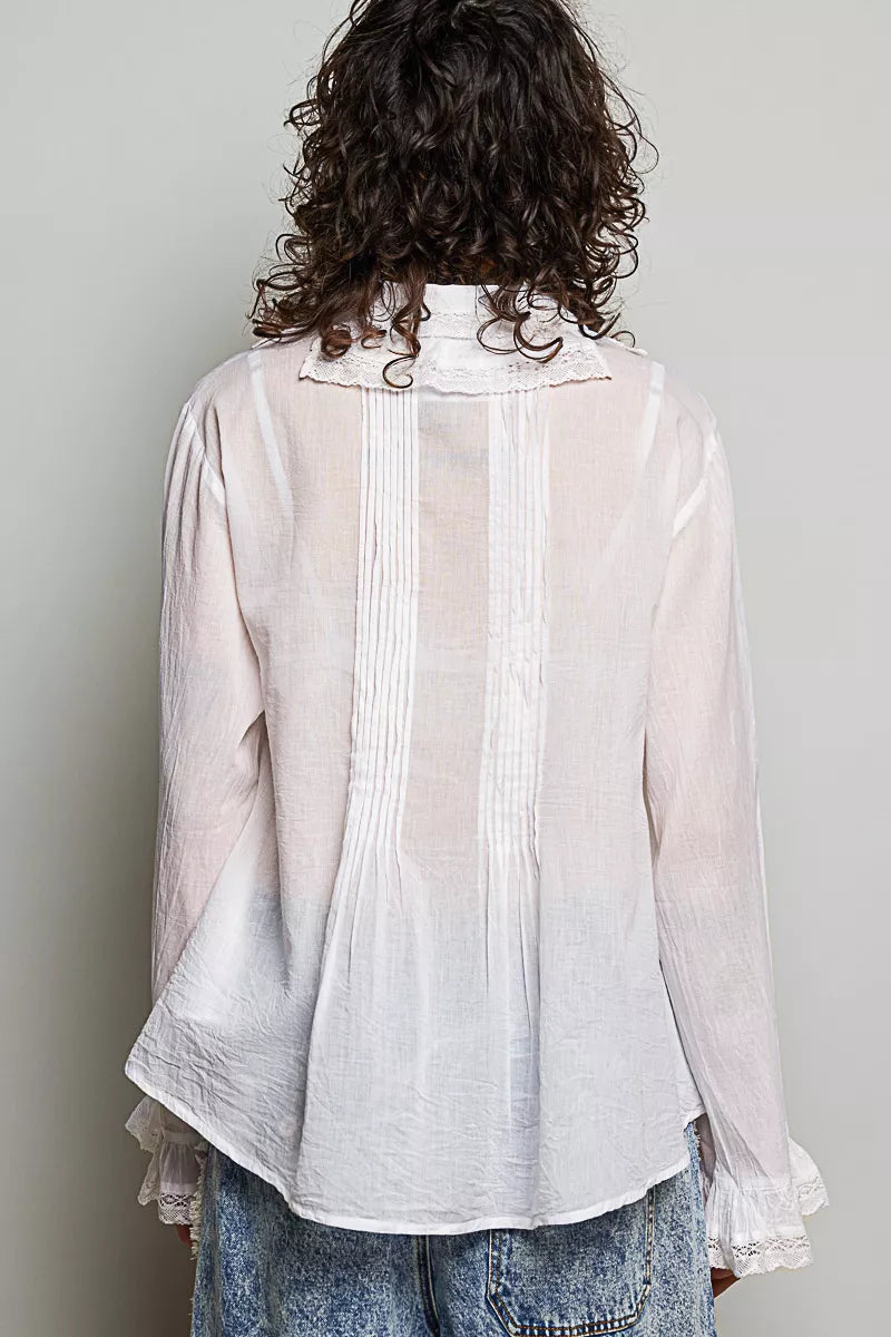Woman wearing an ivory lace trim pintuck button-down blouse from POL, featuring romantic lace details, pleated front accents, and a relaxed fit. Back View 4
