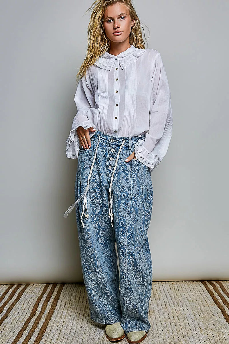 Woman wearing an ivory lace trim pintuck button-down blouse from POL, featuring romantic lace details, pleated front accents, and a relaxed fit. full view