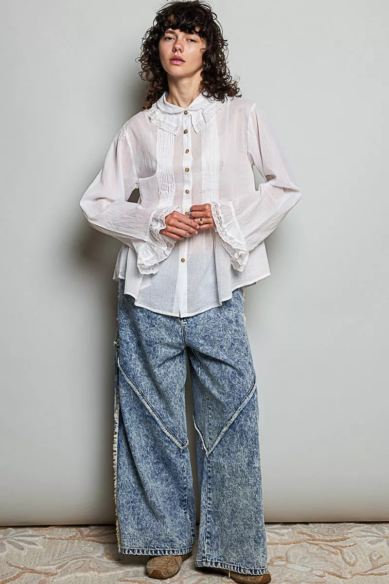 Woman wearing an ivory lace trim pintuck button-down blouse from POL, featuring romantic lace details, pleated front accents, and a relaxed fit. full view 3